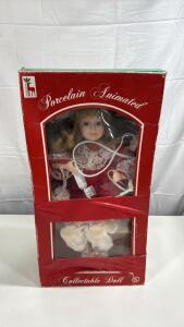 Santa&rsquo;s Best Animated Porcelain Doll