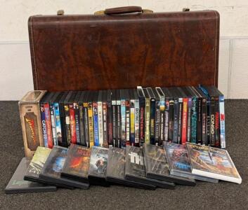 Assortment Of 30 DVDS And VHS Including Indiana Jones, Quantum Voyage, Lord Of The Rings And So Much More!!! Also (1) Vintage Brown Samsonite Hard-Shell Suitcase