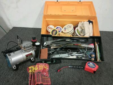 Central Pneumatic Airbrush Compressor 1/8 Horsepower, Stackon Plastic Tool Box With Latched Lid, Variety Of Tools Including Like New 25' Bench top Tape Measure, Voltage Tester