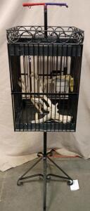 Black, Wrought-Iron Birdcage on a Matching Stand. 53"tall 16"x16"