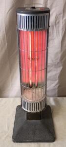 Presto Quartz Electric Heater. It is a Vertical, Tower-Style Electric Heater. It Operates at 750-1500 Watts