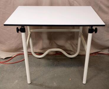 Alvin Onyx fold-away drafting table. The Height Can be Adjusted From 30" to 40" And The Angle of the Working Surface From 0&deg; to 45&deg;.