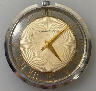 Vintage Caravelle Watch With Gold-Tone Dial, Roman Numerals, And Base Metal Bezel