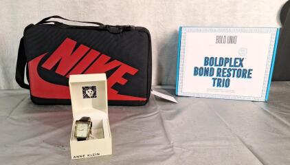 (1) Nike Cross Body Shoe Box / Bag, (1) Anne Klein Women's Wristwatch & (1) BOLD UNIQ Boldplex Bond Restore Trio Hair Care Product Set.