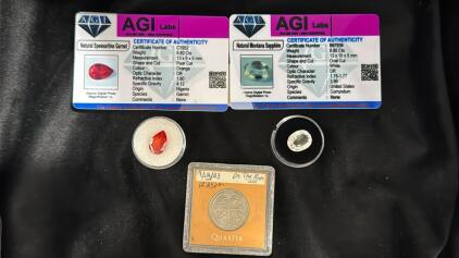 (1) 8.60ct. Natural Spessartine Garnet w/COA ,(1) 8.85ct. Natural Montana Sapphire w/COA , (1) 2019 San Antonio Missions Quarter In Case