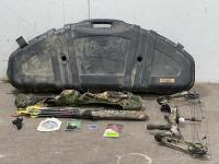 Martin Archery compound bow and accompanying accessories, including a hard case, a soft case, and arrows. Similar used Martin compound bows.