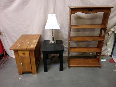 Arts & Crafts Oak Bookcase With a Pierced Heart Cresting Rail. 46"x26"x9" Black Wooden End Table 16"x18"x19" Silver-Plated English Sheffield Banquet Table Lamp With a White Square Shade. Brown Wooden End Table 23"x25"x16"