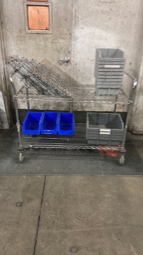 Wire cart on wheels with plastic organizers and Metal rack pieces