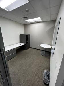 (1)7ftx32in Desk (1)4ftx4ft White Board (1)3ft Round Table (1) 63inx30in Filing Cubby Cabinet