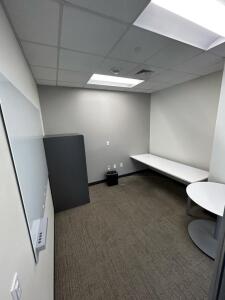 (1)7ftx30in Desk (1)78inx48in White Board (1)3ft Round Table (1) 63inx30in Filing Cubby Cabinet