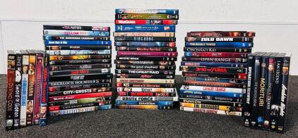 Large Collection Of DVD Movies Including: Sahara, The DaVinci Code, Pink Panther, WarGames, The Last Samurai, Open Range, Angels and Demons and Many More