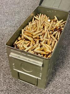 (1150) Count 223 Cleaned Brass Casings in Metal Ammo Box