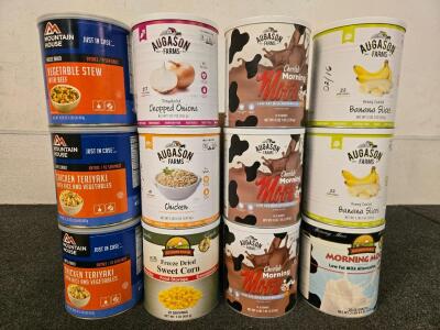 (12) Various Cans Of Dry Food Storage Including: Chocolate Milk, Milk, Banana Slices, Corn, Chicken Teriyaki w/Rice and Vegetables, Chicken, Onions