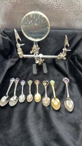(1) Magnified Holder Work Station (8) Souvenir Spoons
