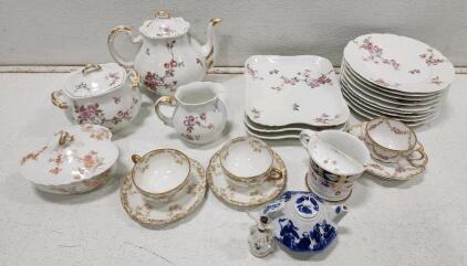 (1) Antique Theodore Haviland Limoges China Tea Pot (9) Vintage Haviland & Co. Limoges Porcelain Plates (1) Antique Meissen Porcelain Figurine (1) Vintage Miniature Chinese Hand Painted Blue & White Octagonal Shaped Teapot And Assorted Haviland China
