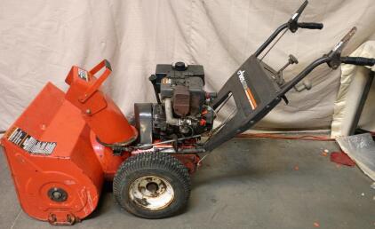 Ariens ST824 Snow Blower, a Two-Stage Gas Snow Removal Machine. 24" Blades