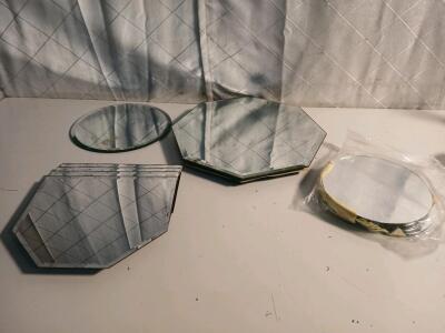 (4) 10"x9" Mirror Placemat/Decor (1) 14" Octagon Swivel Platter/Decor (12) 8" Round Mirror Pieces