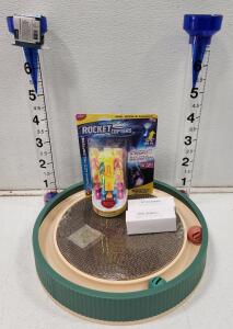 (1) Scratch and Spin Cat and Kitten Tunnel and Track Toy (2) Liquid Collagen Supplement Drops for Dogs (1) RocketCopters LED Toys (2) La Crosse Jumbo Rain Gauge
