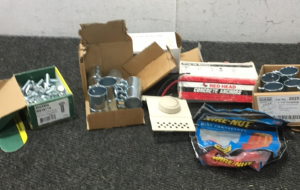 (2) Boxes Of 1-1/4” Couplings, (1) Box of Bolts, (1) Box Of Concrete Anchors