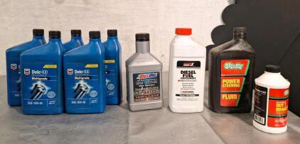 (5) Quarts Of Delo 400 Multigrade 15W-40 Motor Oil, (1) Quart Of Amsoil Full Synthetic 15W-40 Diesel Oil, (1) 32-Oz Bottle Of Power Service Diesel Fuel Supplement, (1) Quart Of Power Steering Fluid, (1) 12-Oz Bottle Of DOT-3 Brake Fluid