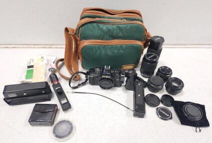 (1) Minolta X-700 35mm SLR Film Camera W/ Accessories And Assorted Lenses (1) Vintage Grips Camera Bag