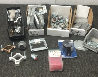 (1) Box EZ Lock Couplings, (1) Bin Of Grounding Clamps, (2) Bins Of Various Electrical Plate Covers