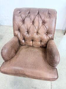 Tufted Brown Leather Armchair with Nailhead Trim approximately 30 in x 35 in x 40 in.