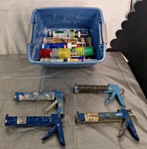 (4) Caulk Guns & Tub Of Assorted Caulk & Construction Adhesives