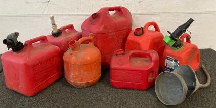 (7) Gas Cans And (2) Funnels