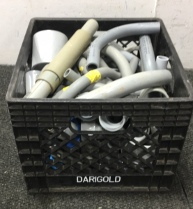 Milk Crate Full Of Various PVC Non-Metallic Conduit