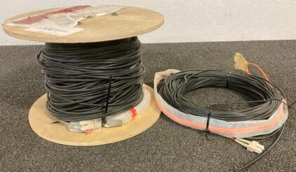 (1) Spool Of Unkown Black Cable, And (1) Spool Of Coaxial Cable