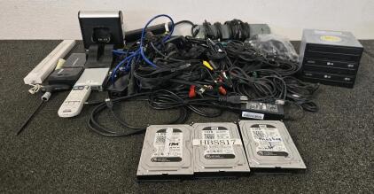 Collection of Electronics Including: (3) 1TB Hard Drives, (3) Disc Drivers, Various Cables, & More