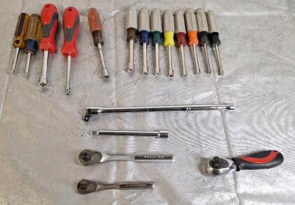 (3) Socket Wrenches, (1) 1/4", (1) 3/8" ,(1) Dual 1/4" / 3/8", (1) 3/8" Extension, (1) 3/8" Breaker Bar & (13) Assorted Nut Drivers