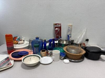 Miscellaneous kitchen items bottles plates and more