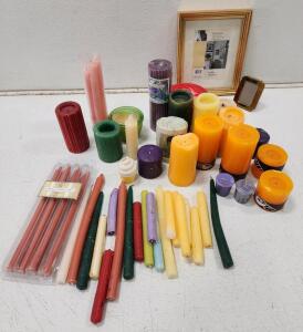 Assorted Variety of Candles And Picture Frames