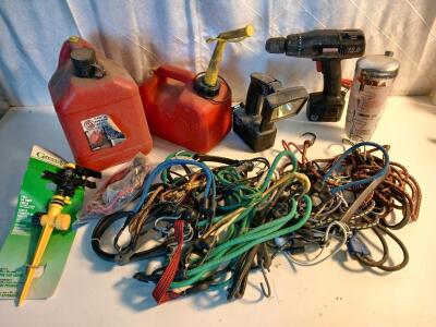 (2) Plastic Gas Can (1) Craftsman 12V Power Drill (15+) Bungy Cords & More