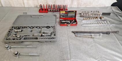 (1) 3/8" Drive Ratchet, (1) 1/2" Drive Ratchet & Assorted Sockets, Extensions, & Adapters