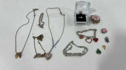 (3) Assorted Necklaces (3) Assorted Bracelets (1) Ring (4) Charms
