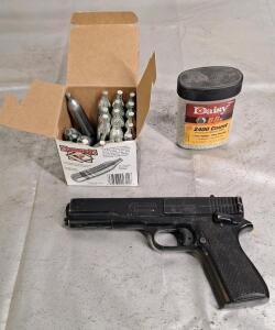 (1) Vintage Marksman Spring Powered BB Gun, (20) Crossman Co2 Cartridges & (1) Container Of Daisy BBs