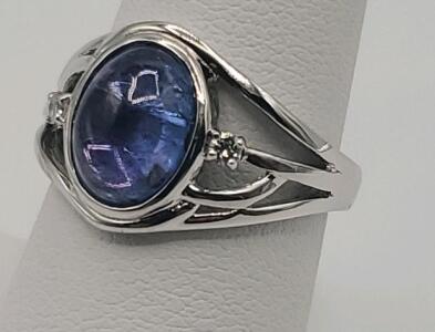 Silver Ring with Oval Tanzanite and Diamond Accents, Serial K22E4