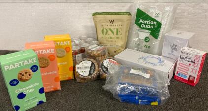 (12) Bloody Mary Mocktails, VitaHustle Superfood Protein, Partake Cookies, Kombucha Berry Packets, (2) Sink Bounce Core Drain Strainers, 250 4oz Portion Cups, Sun Dried Turkish Figs, Coffee Stirrers, Peeps Gingerbread Men