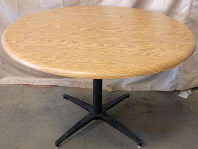 Vitra Bistro Table With a Round Top and a Star-Shaped Base. 42"x42"x28"