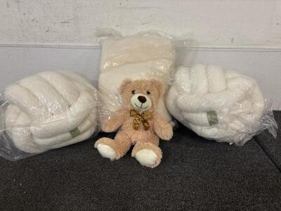 90x90 Plush Blanket (2) Knot Pillows (1) Stuffed Teddy Bear