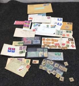 Over (100) Foreign and American Stamps