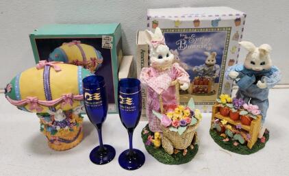 (1) Vintage Fabric Mache Spring Bunnies Figurines (1) Windsor Collection Musical Easter Bunny Hot Air Balloon Music Box (2) Royal Princess Farewell Cruise 2005 Cobalt Blue Champagne Glass And More