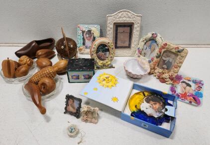 (9) Assorted Decorative Photo Frames (10) Assorted Wooden Fruits And Vegetables (2) Mikasa Mayfair Glass Bowl (1) Coco Dowley Ceramic Fish Salt and Pepper Shakers And More