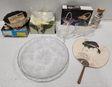(1) WP&G Bountiful Crystal Frosted Basket W/ Wicker Handles (1) vintage Mikasa Flair Crystal Glass Bowl (1) Home Beautiful Crystal Winter Holly Round Platter (1) Vintage Nordic Ware 6-Cup Bundt Pan (1) Japanese Non-Folding Uchiwa Fan