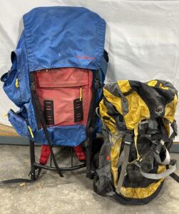 Pair Of Hiking Bags - 1 Osprey Exposure 50 & 1 Camp Trails