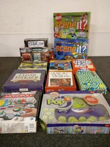 Assortment of Family Board Games Escape Room Scene It Trivial Pursuit Family Fued And More