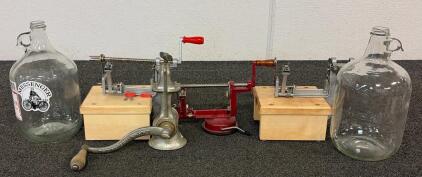 Vintage Kitchen Tools! Including (3) Apple Peelers, (1) Meat Grinder, And (2) Clear Glass Jugs